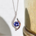 Curvaceous Tanzanite and Diamond Pendant