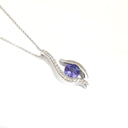 Curvaceous Tanzanite and Diamond Pendant