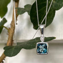 Cushion Bezel Set London Blue Topaz Pendant with Diamond accent
