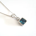 n Blue Topaz Pendant with Diamond accent