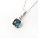 n Blue Topaz Pendant with Diamond accent