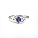 Decorative White Gold Tanzanite and Diamond Ring