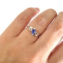 Decorative White Gold Tanzanite and Diamond Ring