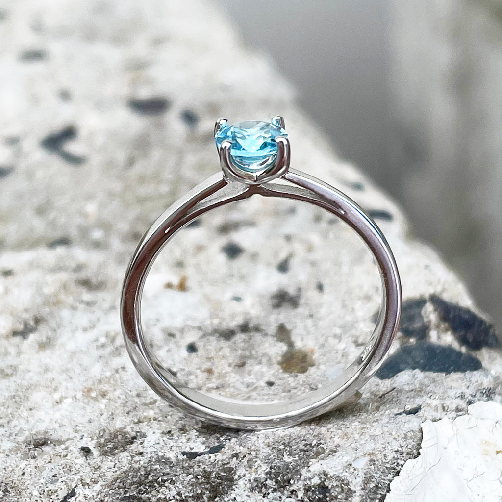 Delicate Solitaire Blue Topaz Four Claw White Gold Ring