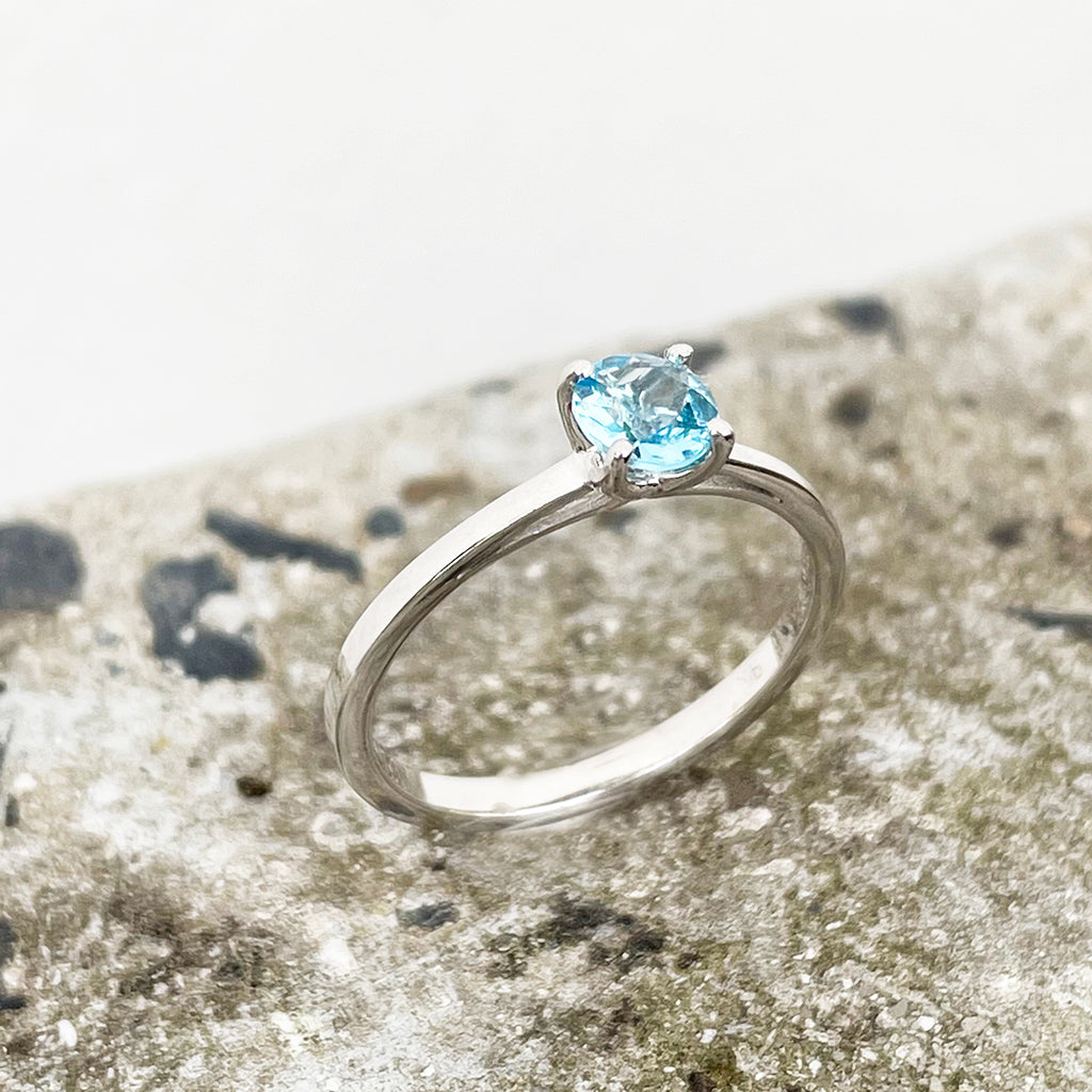 Delicate Solitaire Blue Topaz Four Claw White Gold Ring