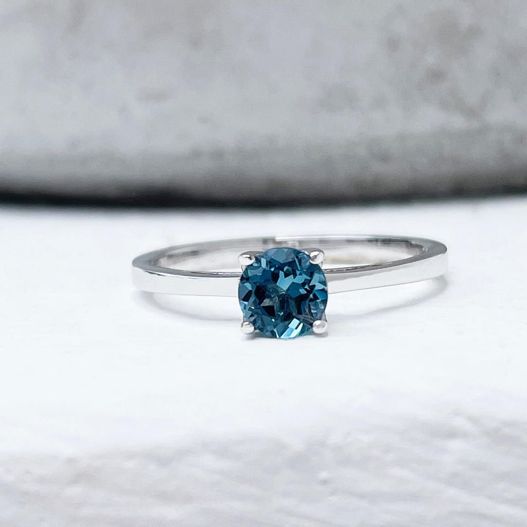 Delicate Solitaire London Blue Four Claw White Gold Ring