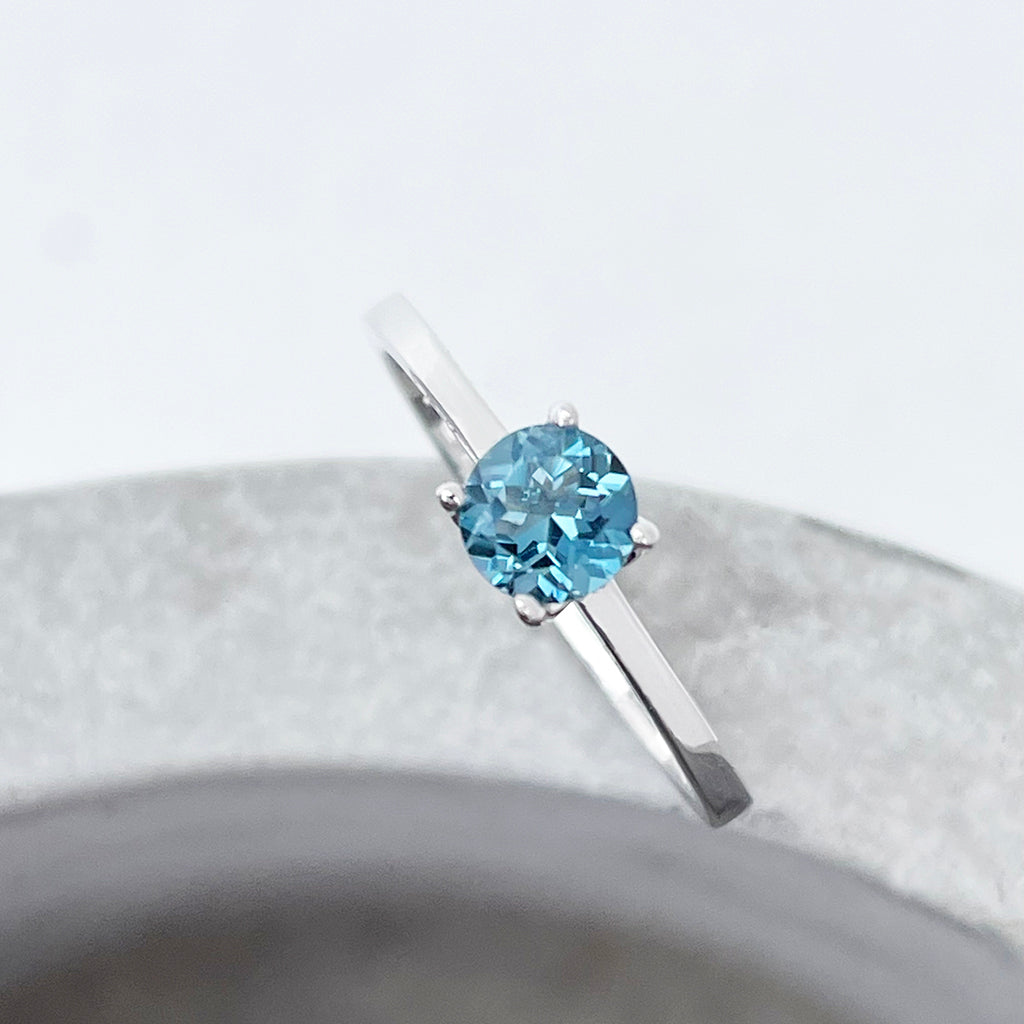 Delicate Solitaire London Blue Four Claw White Gold Ring