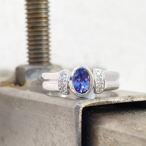 Double Band Oval Tanzanite Ring with Elaborate Diamond Shoulders