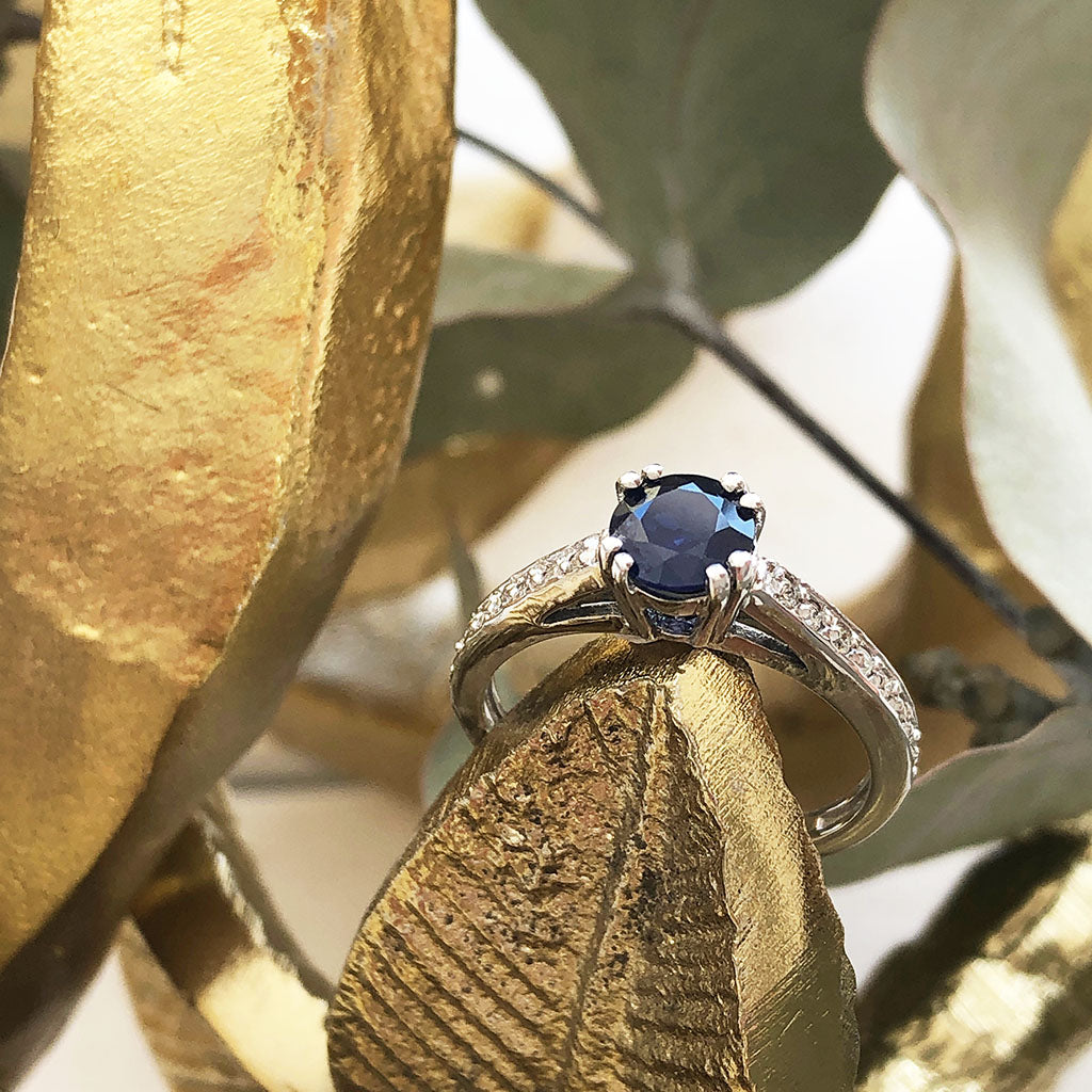 Elegant Blue Sapphire Halo Engagement Ring