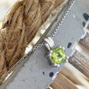 Double Claw Cushion Cut Peridot Pendant