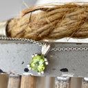 Double Claw Cushion Cut Peridot Pendant