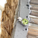 Double Claw Cushion Cut Peridot Pendant
