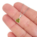 Double Claw Trilliant Cut Peridot Pendant