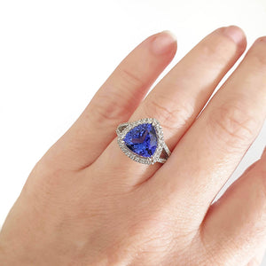 Double Diamond Shoulder Trilliant Cut Tanzanite and Diamond Halo Ring