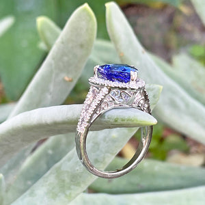 Double Diamond Shoulder Trilliant Cut Tanzanite and Diamond Halo Ring