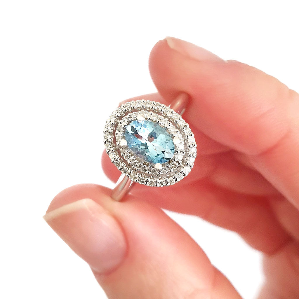 Double Halo Oval Cut Aquamarine and Diamond Ring