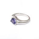 Dynamic Split Shank Trilliant-Cut Tanzanite Ring