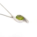 Dynamic White Gold Twisted Oval Cut Peridot Pendant