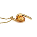 Dynamic yellow Gold Twisted Oval Cut Citrine Pendant