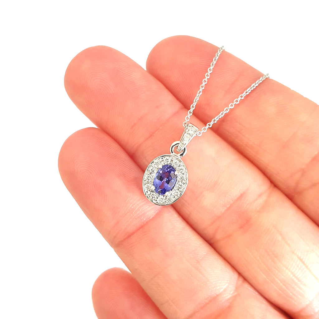 Classically Elegant Oval Tanzanite and Diamond Halo Pendant