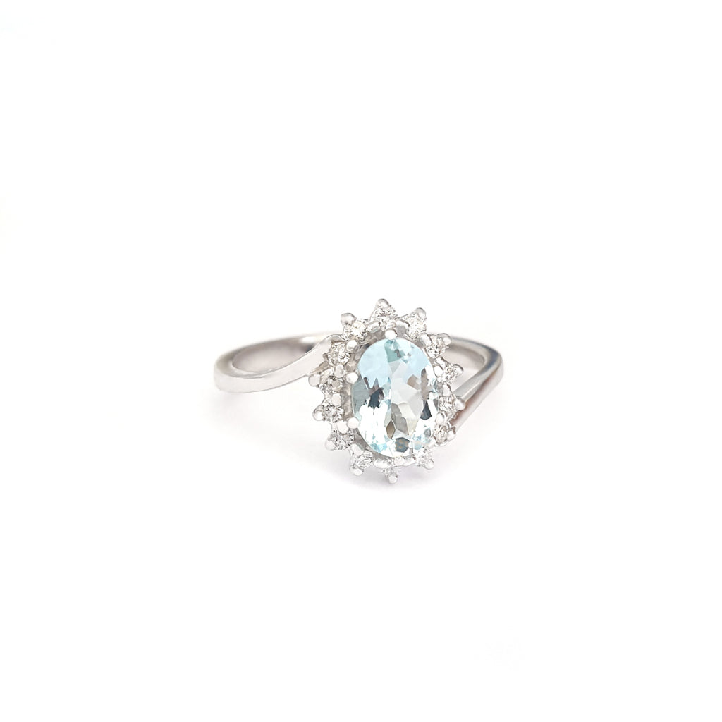 Timeless With A Twist Oval Aquamarine with Diamond Halo Ring