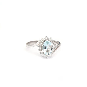 Timeless With A Twist Oval Aquamarine with Diamond Halo Ring