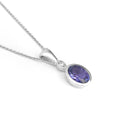 Elegant Tube Set Oval Tanzanite and Diamond White Gold Pendant