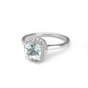 Raised Cushion Cut Aquamarine and Diamond Halo Ring⁠