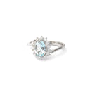 Timeless With A Twist Oval Aquamarine with Diamond Halo Ring