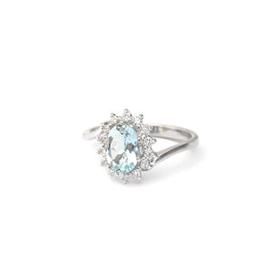 Timeless With A Twist Oval Aquamarine with Diamond Halo Ring