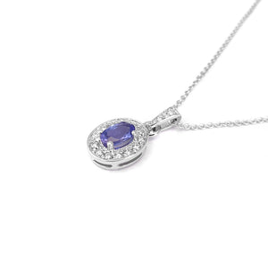 Classically Elegant Oval Tanzanite and Diamond Halo Pendant