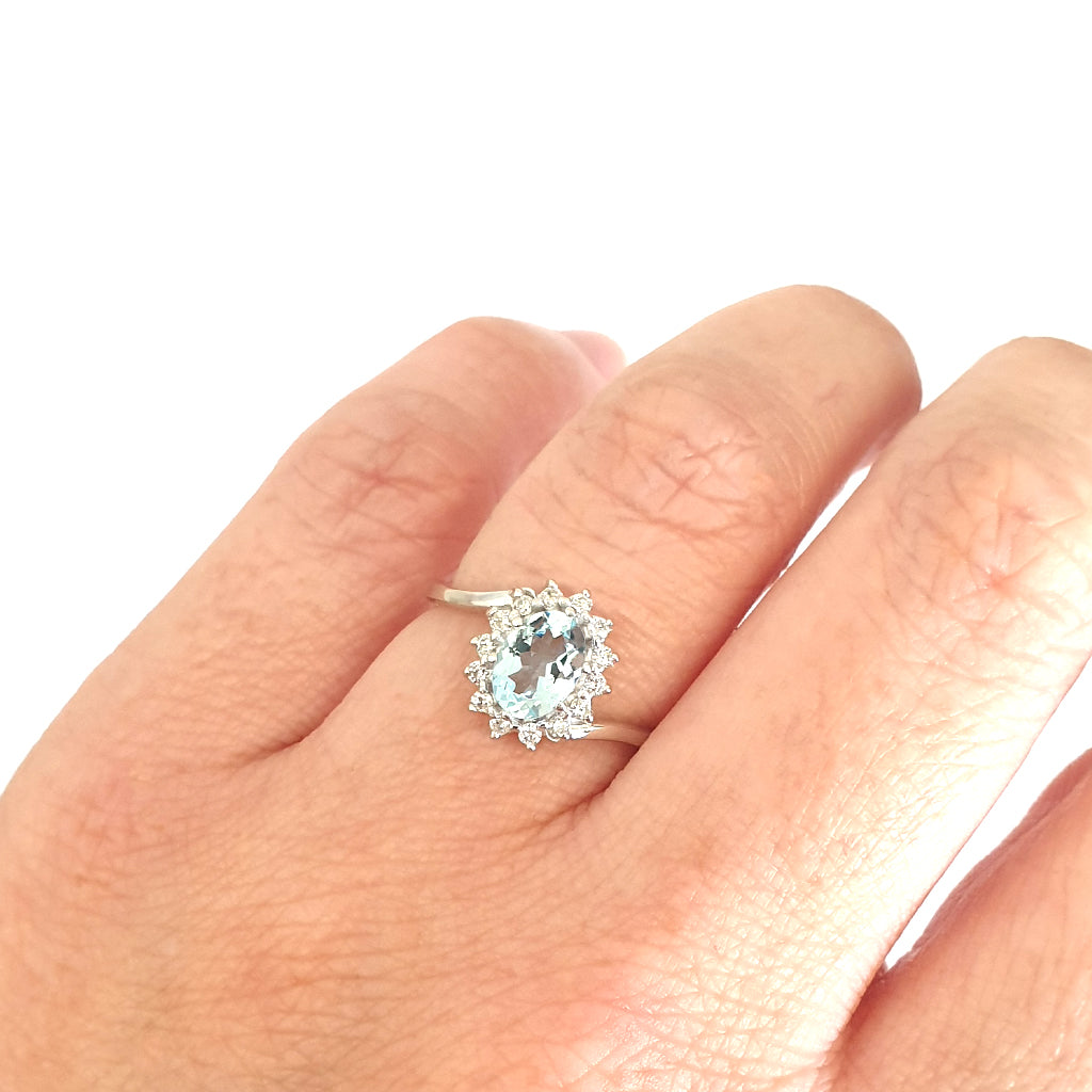Timeless With A Twist Oval Aquamarine with Diamond Halo Ring