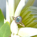Elegant Aquamarine Rose Gold Halo Diamond Ring