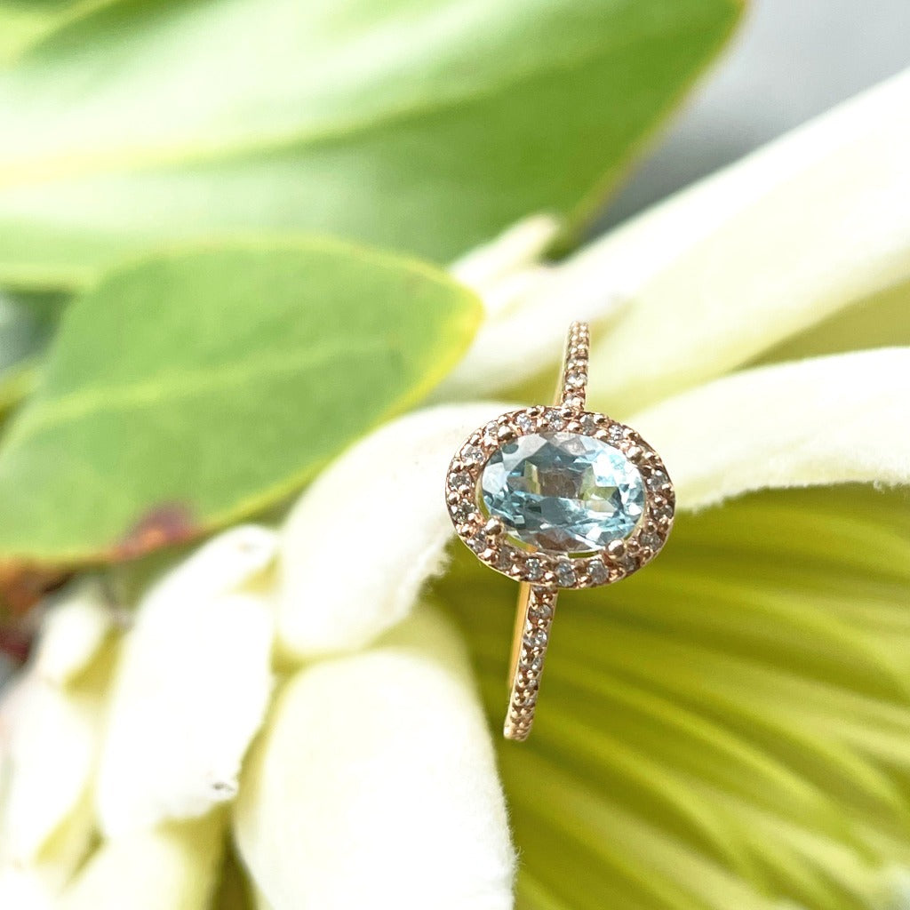 Elegant Aquamarine Rose Gold Halo Diamond Ring