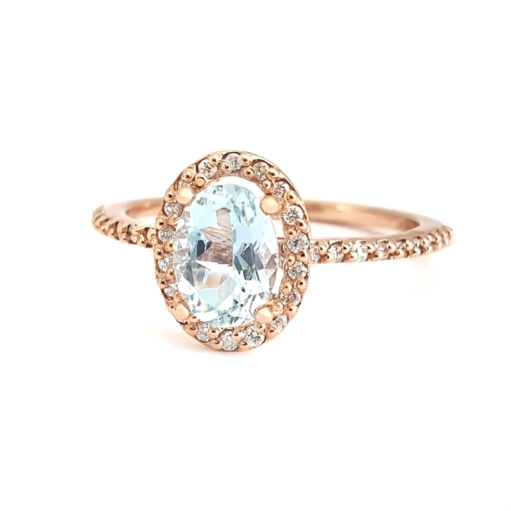 Elegant Aquamarine Rose Gold Halo Diamond Ring