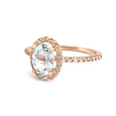 Elegant Aquamarine Rose Gold Halo Diamond Ring