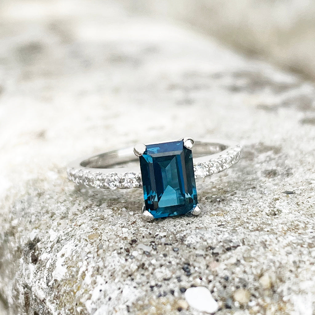 Emerald cut blue topaz engagement ring sales