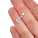   Elegant Oval Cut Aquamarine and Trilogy Diamond Pendant