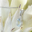 Elegant Oval Cut Aquamarine and Trilogy Diamond Pendant