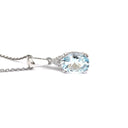   Elegant Oval Cut Aquamarine and Trilogy Diamond Pendant