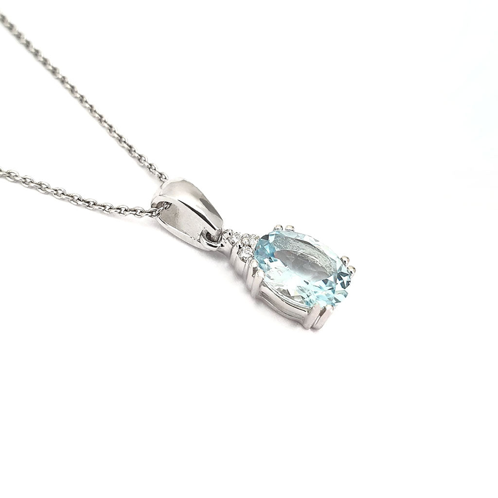   Elegant Oval Cut Aquamarine and Trilogy Diamond Pendant