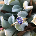 Elegant Oval Cut Bezel Set Solitaire Tanzanite Ring