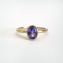 Elegant Oval Cut Bezel Set Solitaire Tanzanite Ring