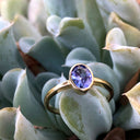 Elegant Oval Cut Bezel Set Solitaire Tanzanite Ring