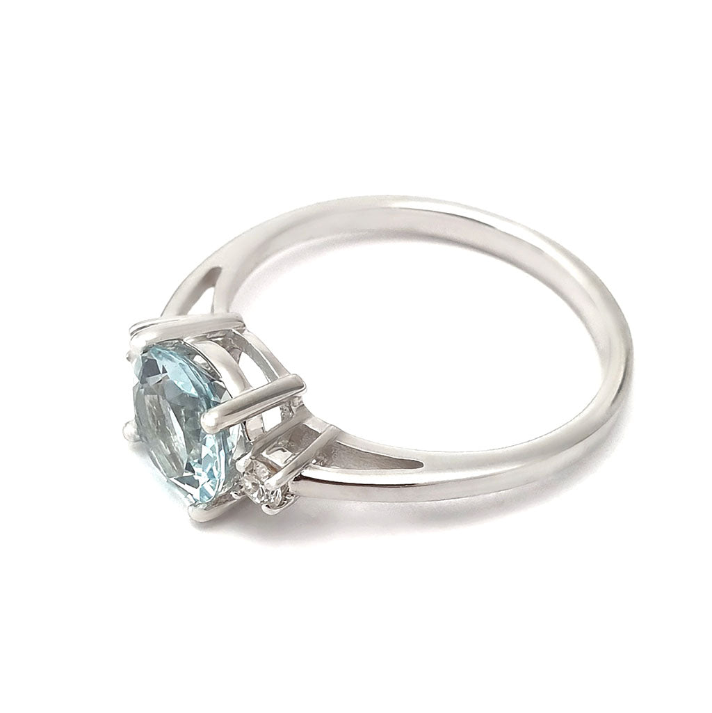 Elegant Round Cut Aquamarine and Accent Diamond Ring