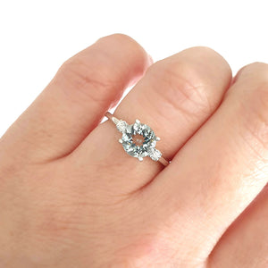Elegant Round Cut Aquamarine and Accent Diamond Ring