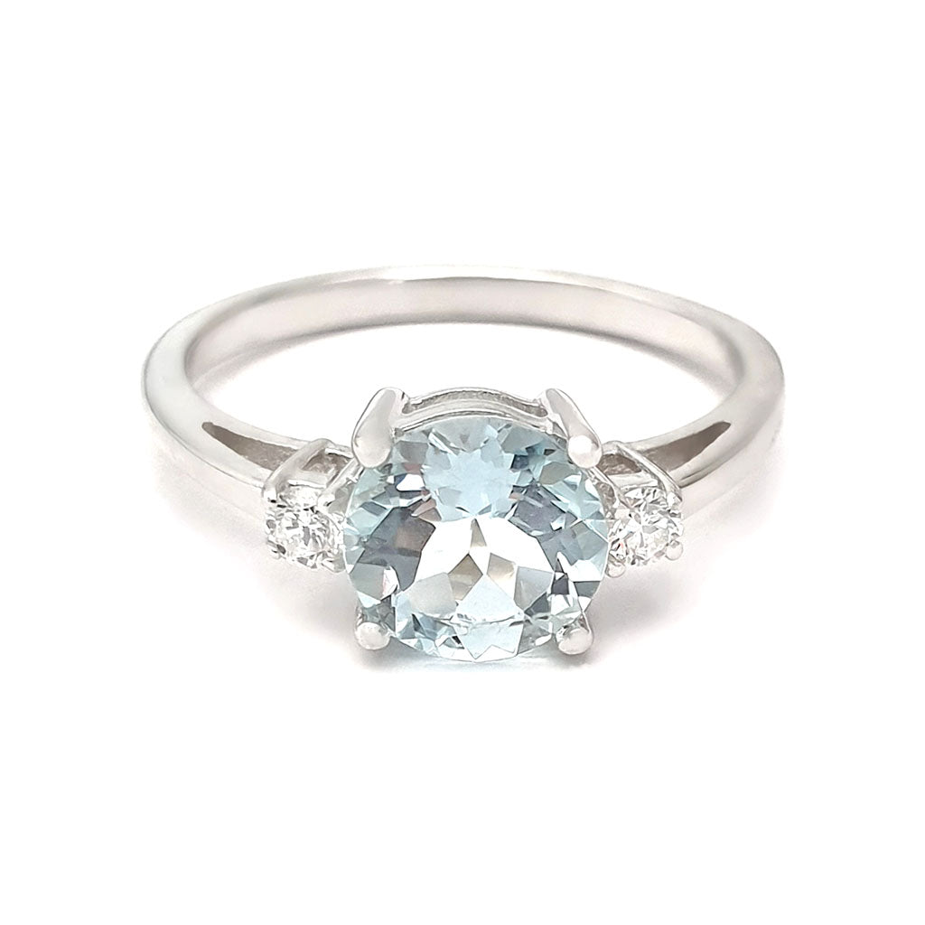Elegant Round Cut Aquamarine and Accent Diamond Ring
