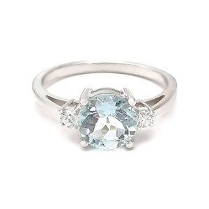Elegant Round Cut Aquamarine and Accent Diamond Ring
