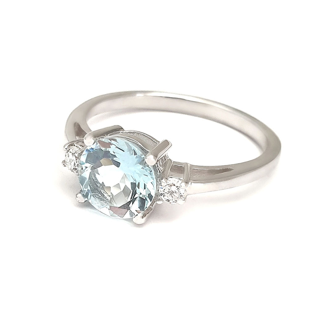 Elegant Round Cut Aquamarine and Accent Diamond Ring