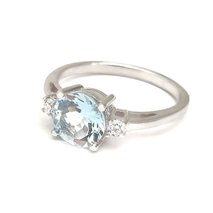 Elegant Round Cut Aquamarine and Accent Diamond Ring